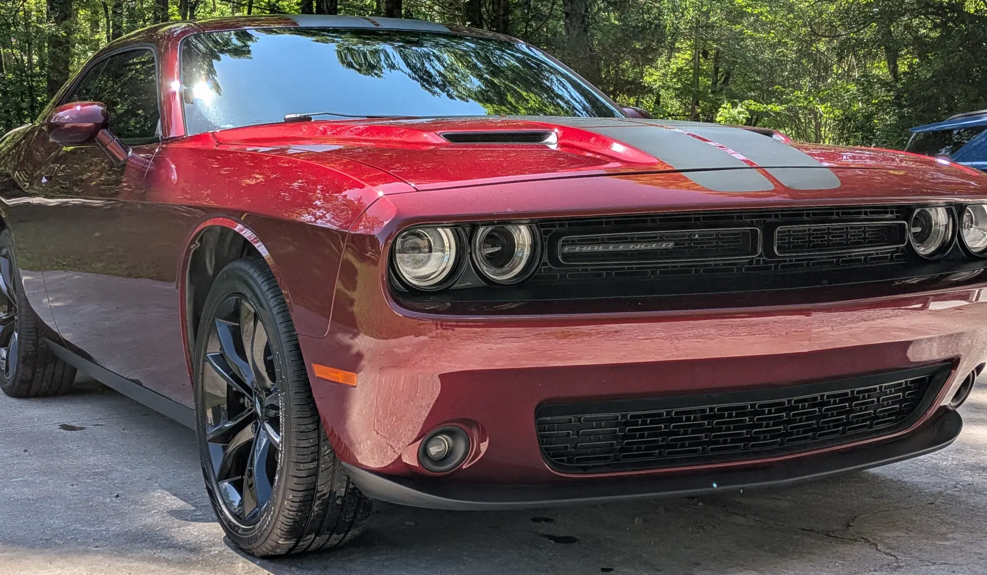 Red Dodge Challenger after mobile car detailing